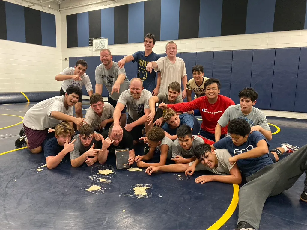 Daniel Ramsey coaching the Rosemont wrestling team